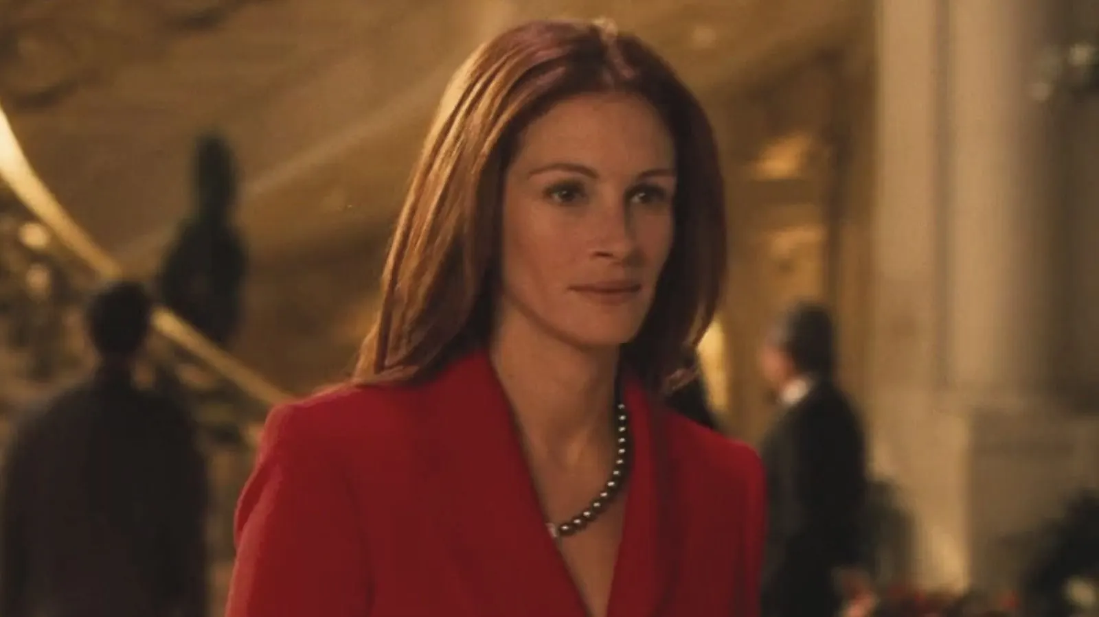 Tess Ocean in a red jacket